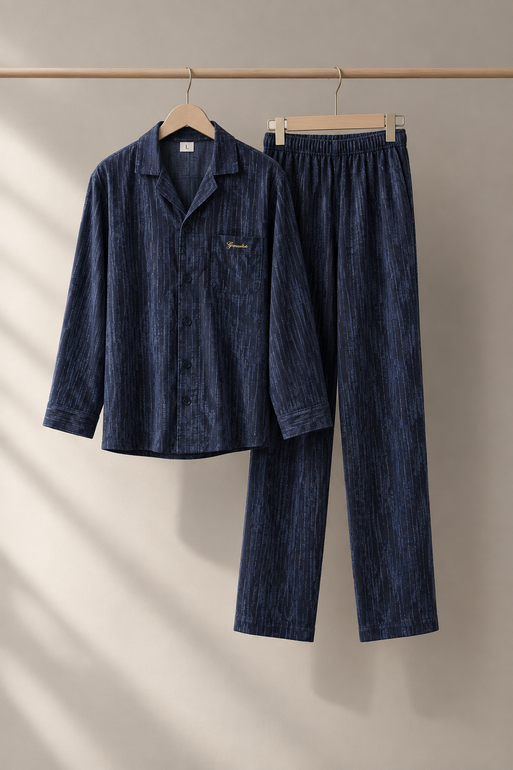 Navy pajama set on hangers