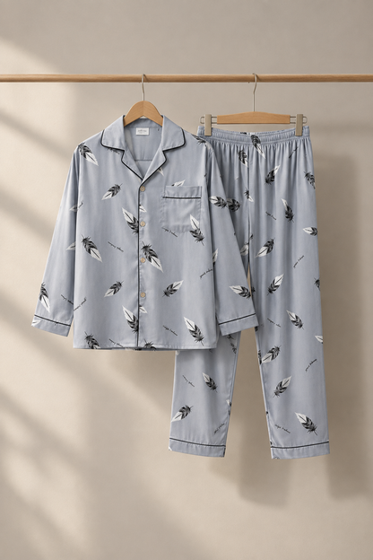 Gray feather print pajama set on hangers