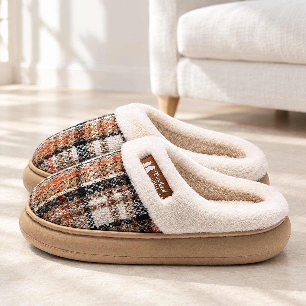 Khaki pair of plush thick-soled slippers photographed in a bright white room