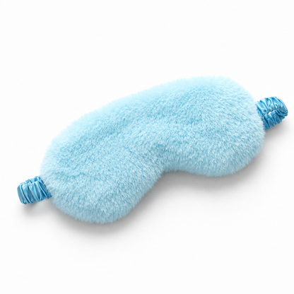 Single sky blue plush sleep eye mask on white